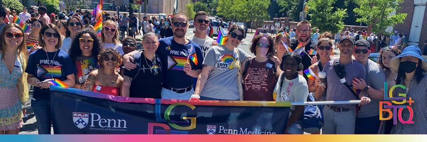 PPMC staff hold a Penn Medicine banner at the Philadelphia Pride Parade
